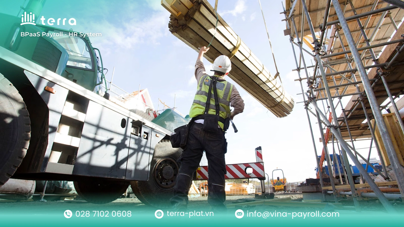 Blue collar worker handling materials at construction site