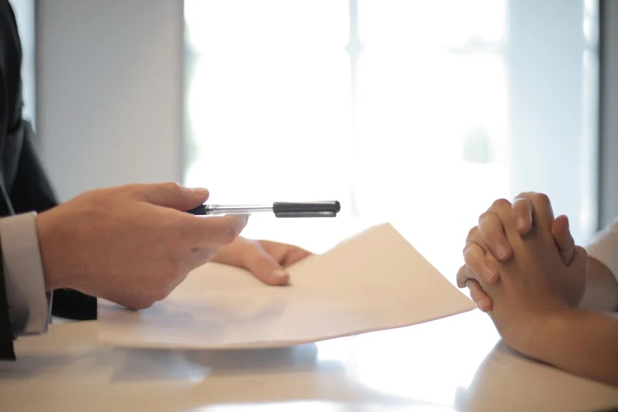 Signing a notarized power of attorney before leaving Vietnam