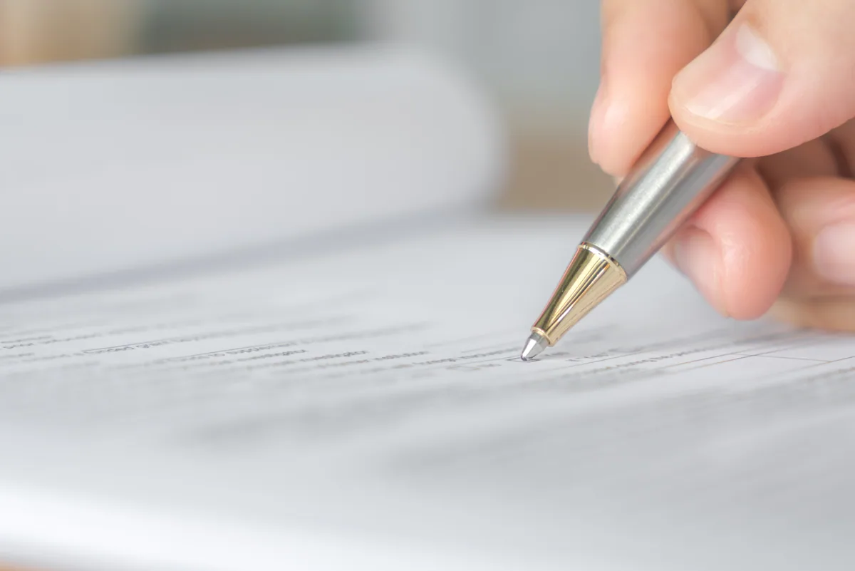 Social insurance paperwork being completed to settle a late social insurance payment in Vietnam