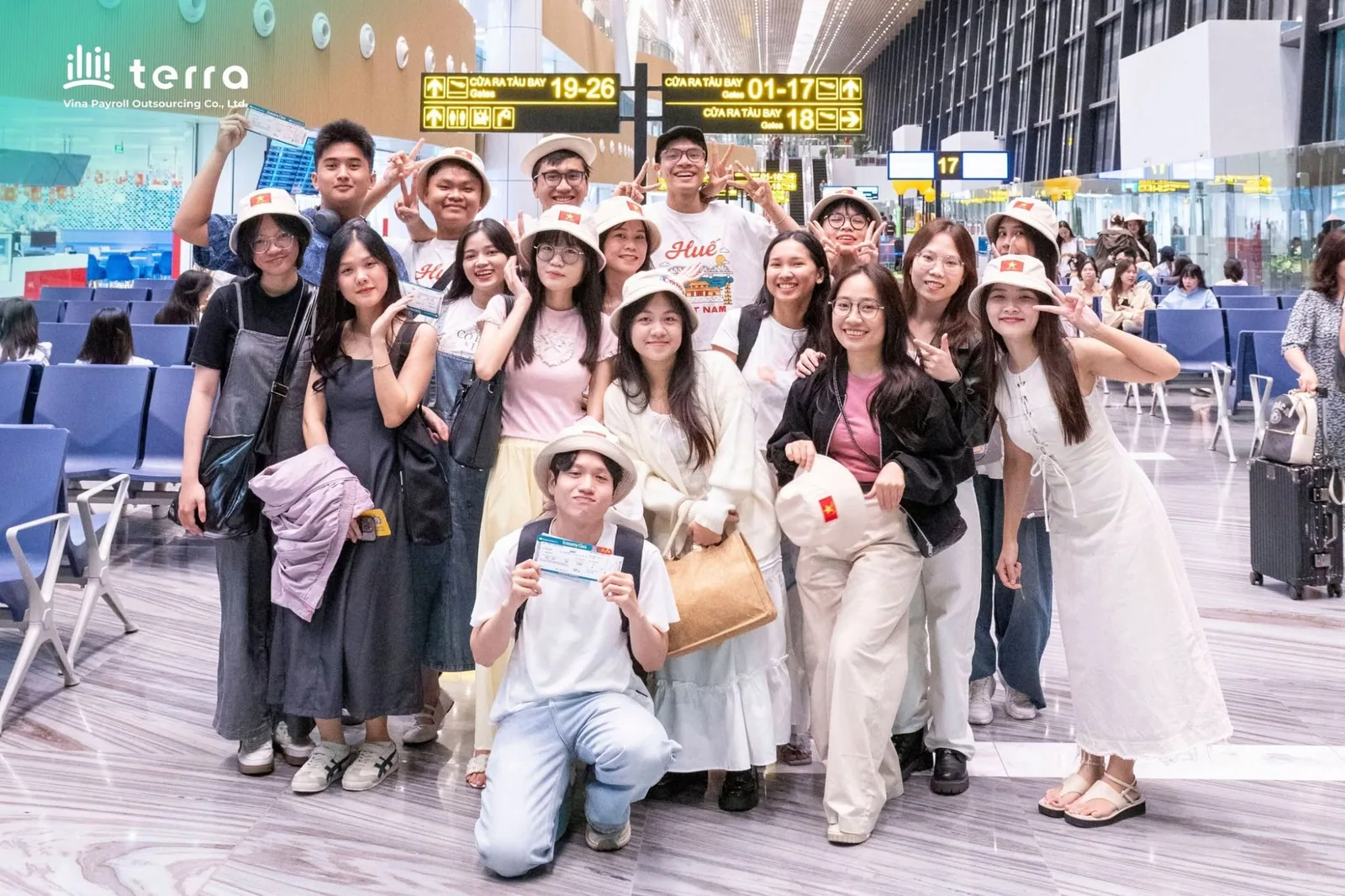 terra team at the airport for the company trip